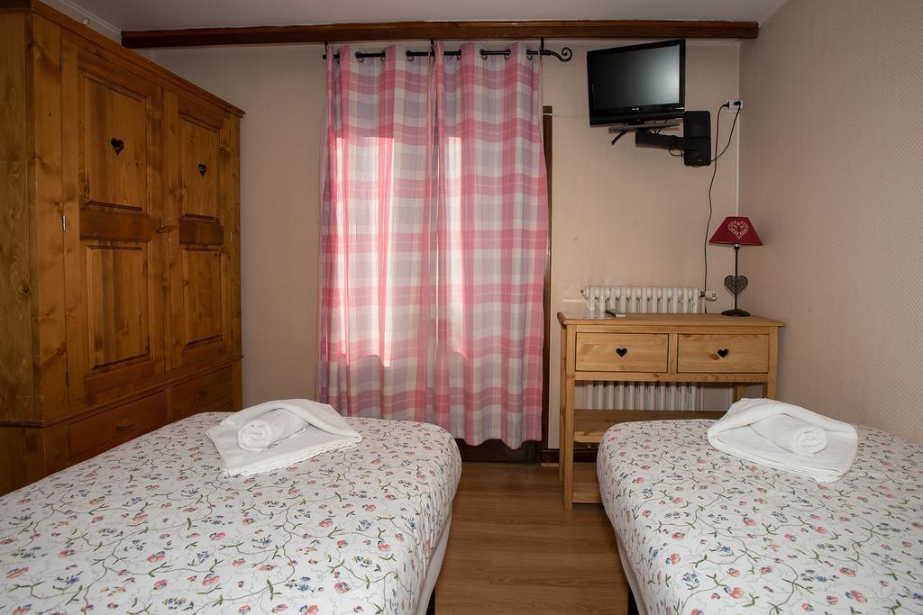 Hotel Le Cairn Les Deux Alpes Rum bild